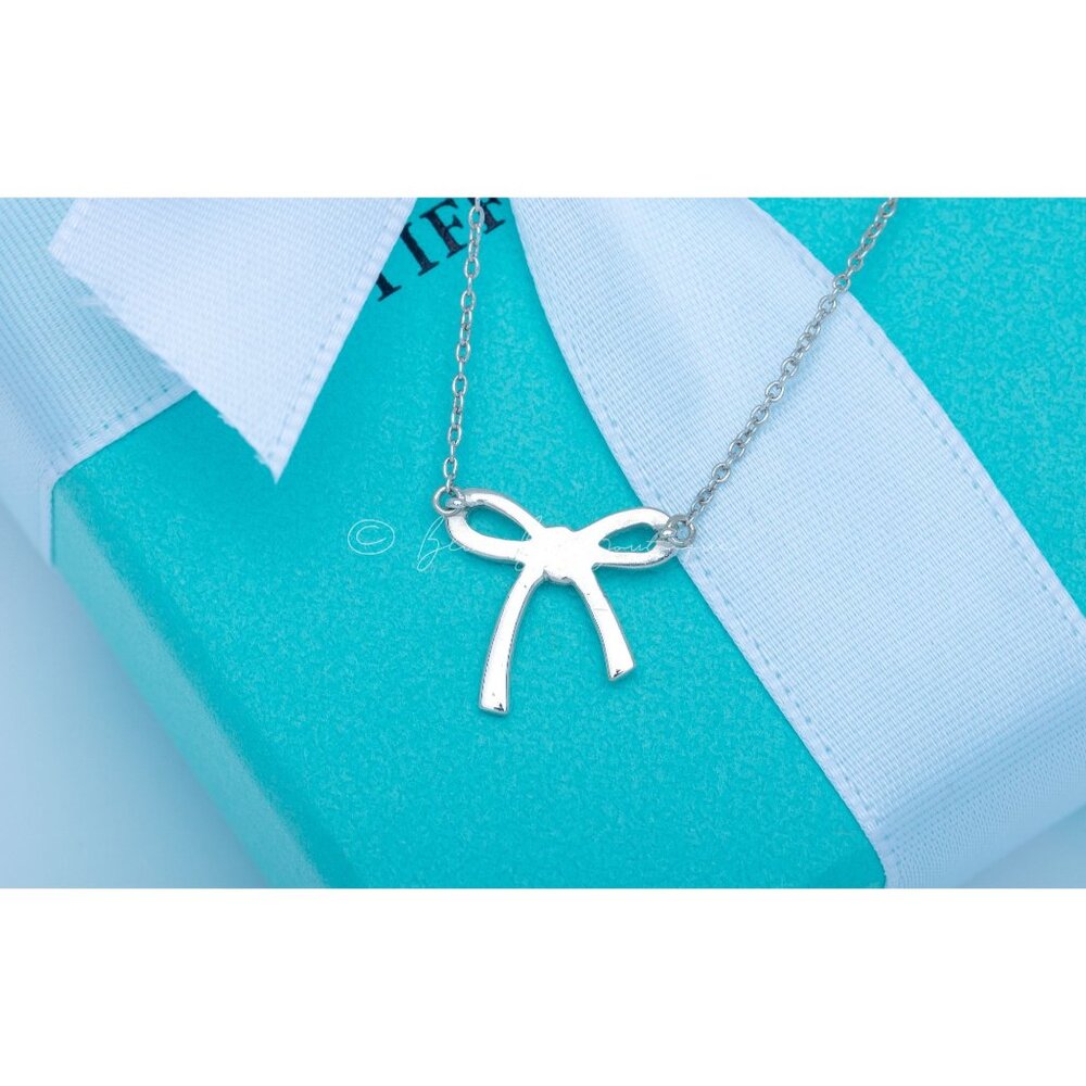 Tiffany & Co. Vintage Bow Necklace Ribbon Knot Pendant in Silver on a 16" Chain - Picture 7 of 9